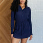 Getting Out Long Sleeve Hoodie Romper in Navy