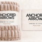 Pearl Cream blanket rolled with Anchored Arrows sleeve
